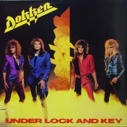 DOKKEN ‎– Under Lock And...